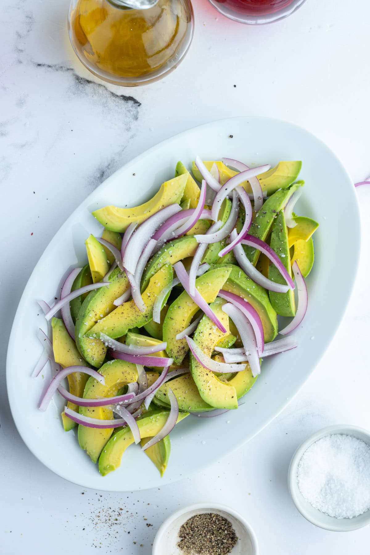 avocado and onion salad on oval platter