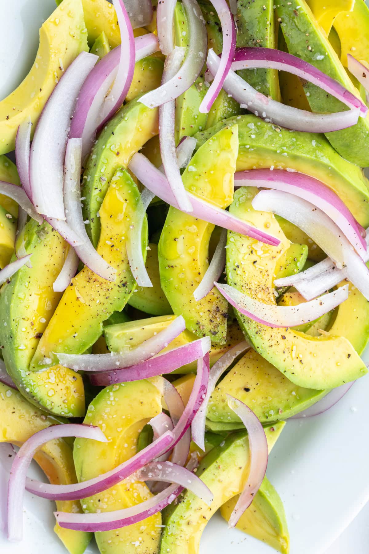 close up avocado and onion salad