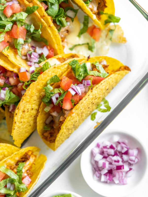 oven baked chicken tacos in casserole dish