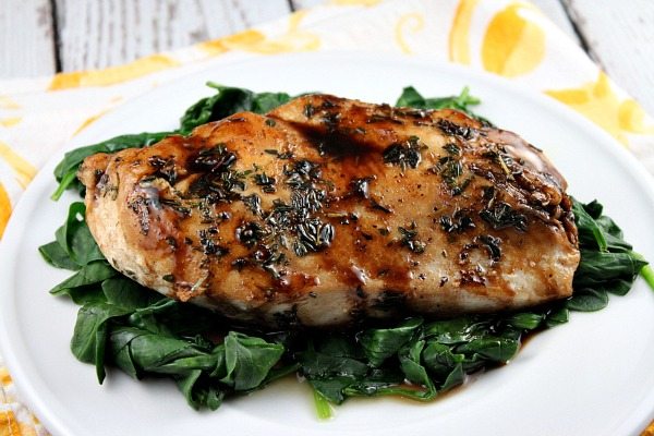 Balsamic Glazed Chicken with spinach on plate