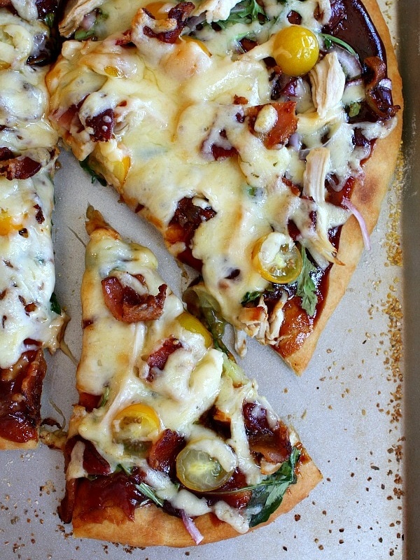 bbq chicken pizza with slice cut out