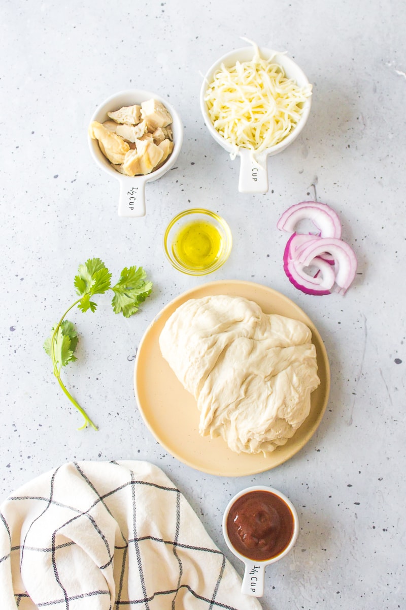 ingredients displayed for making barbecue chicken pizza