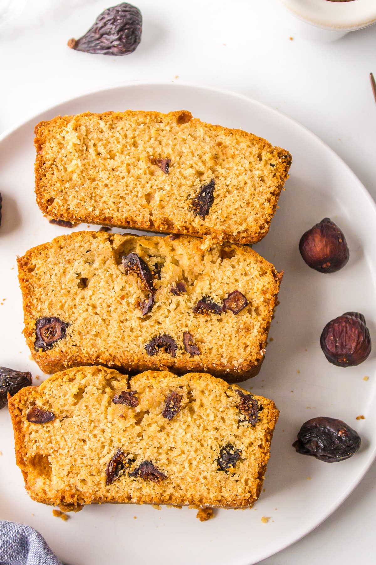 three slices of caramel fig bread on a plate