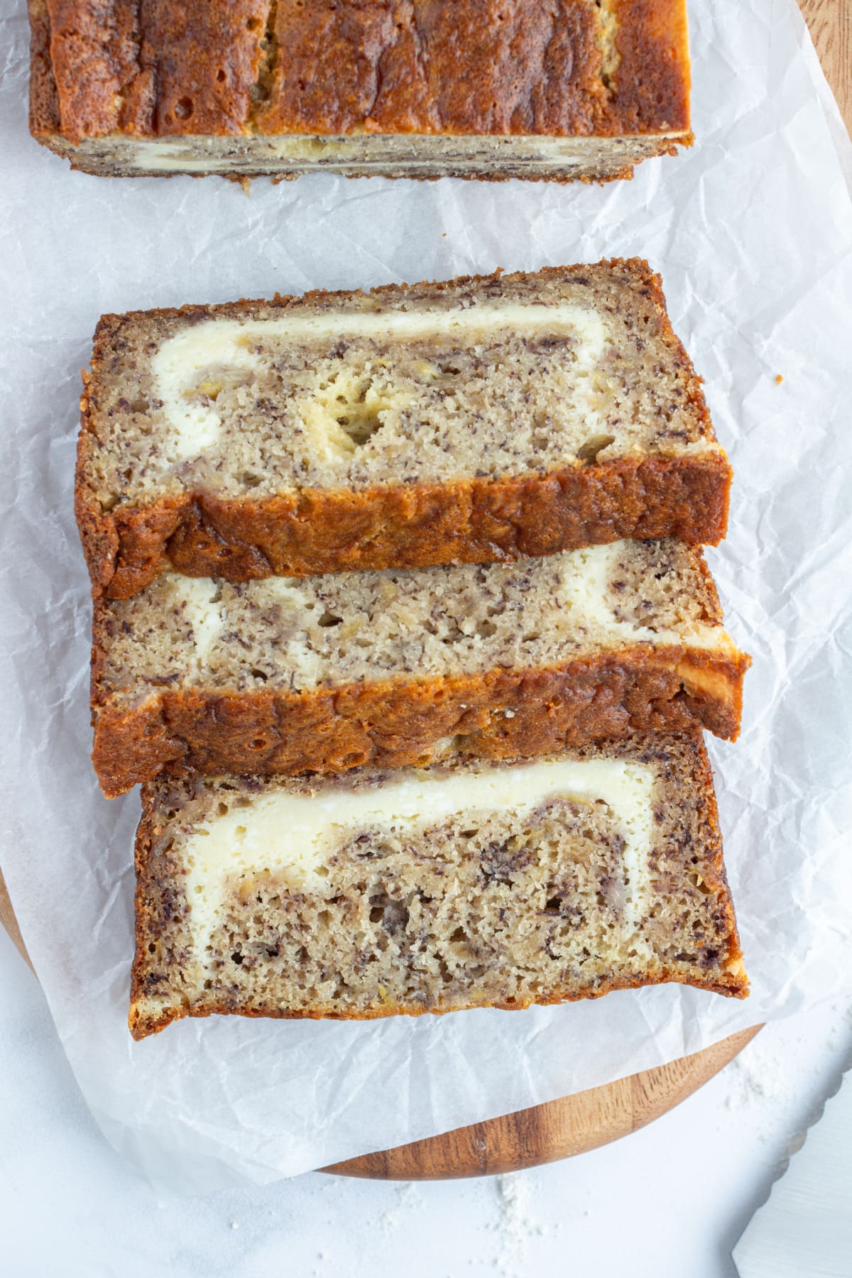 three slices of cheesecake banana bread