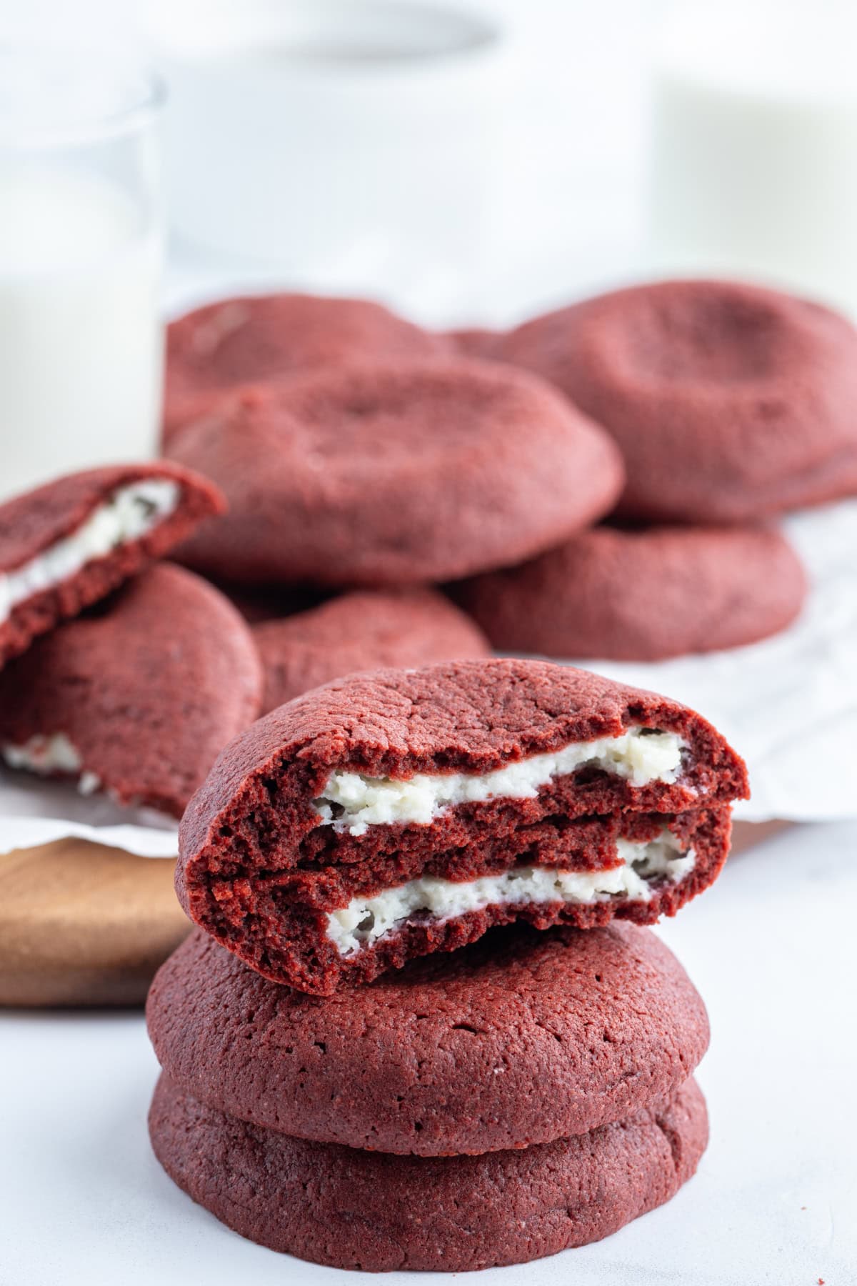 cheesecake stuffed red velvet cookies stacked