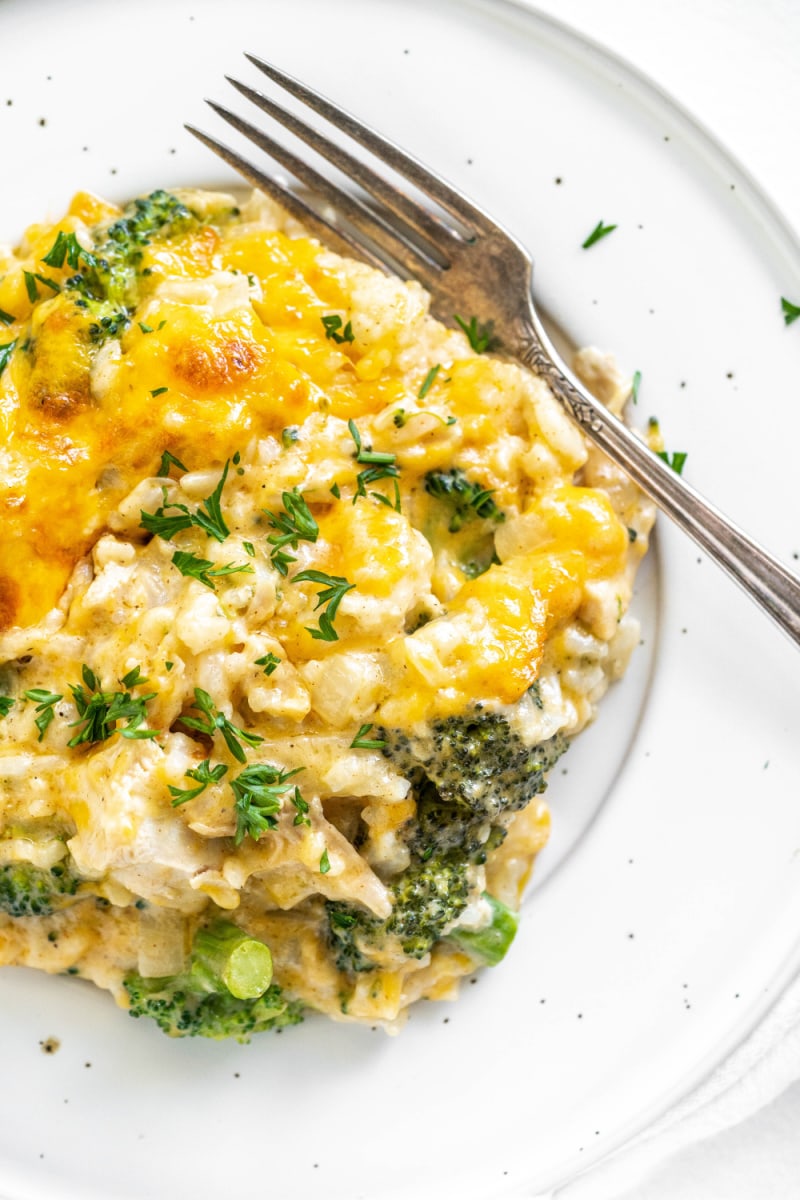 serving of chicken and broccoli rice casserole on a plate with a fork