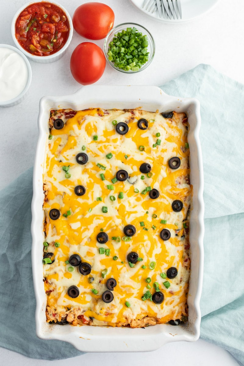 chicken enchilada casserole in white dish