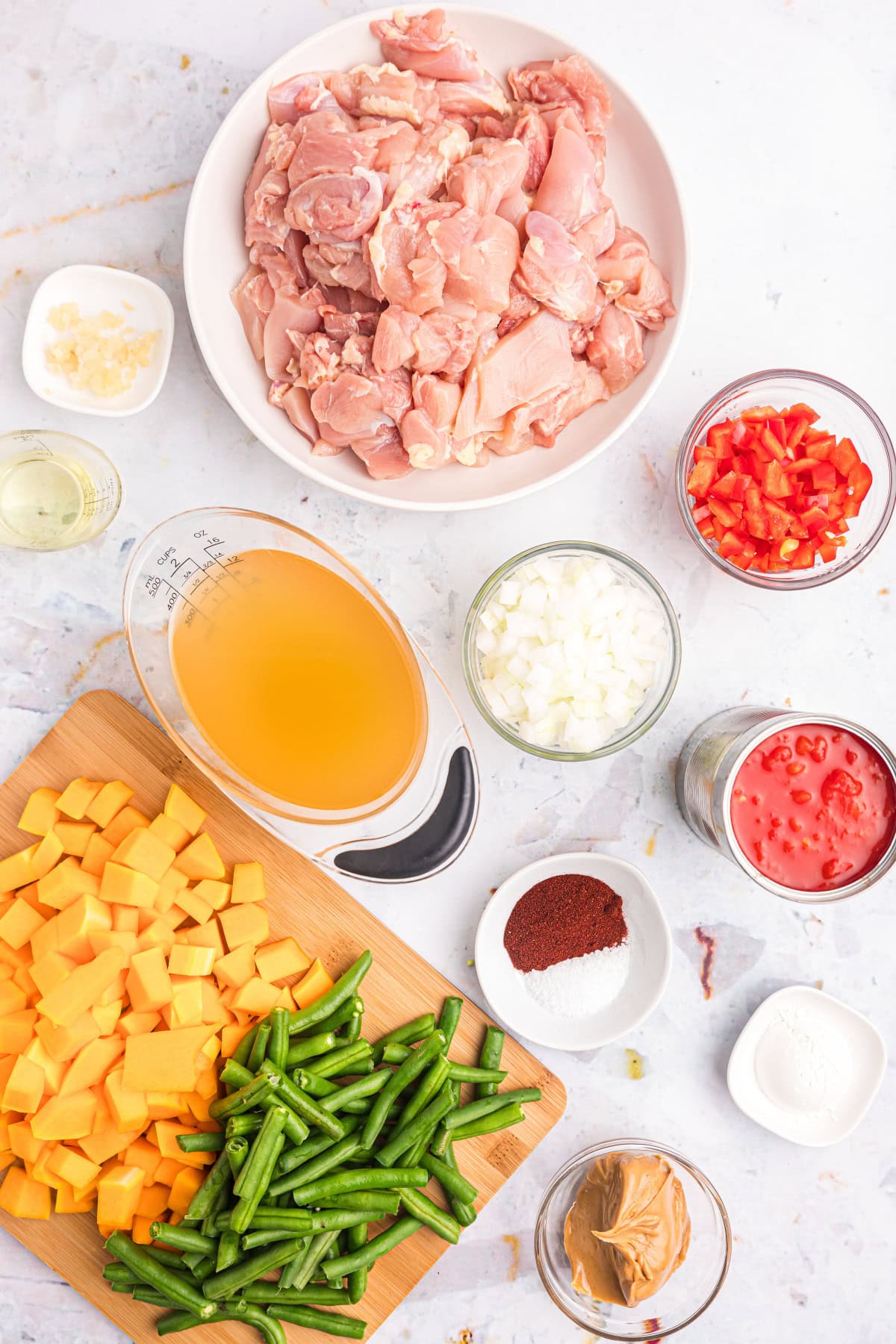 ingredients displayed for making chicken pumpkin stew