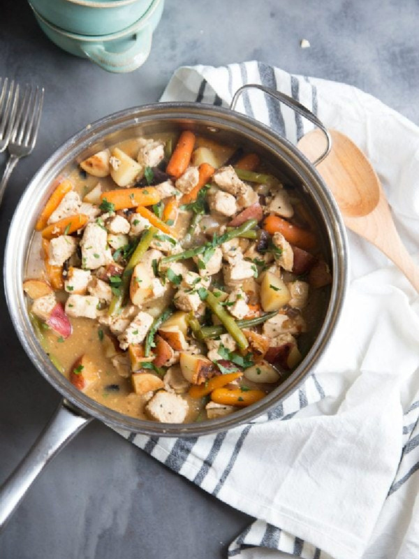 pan of chicken stew with balsamic roasted vegetables