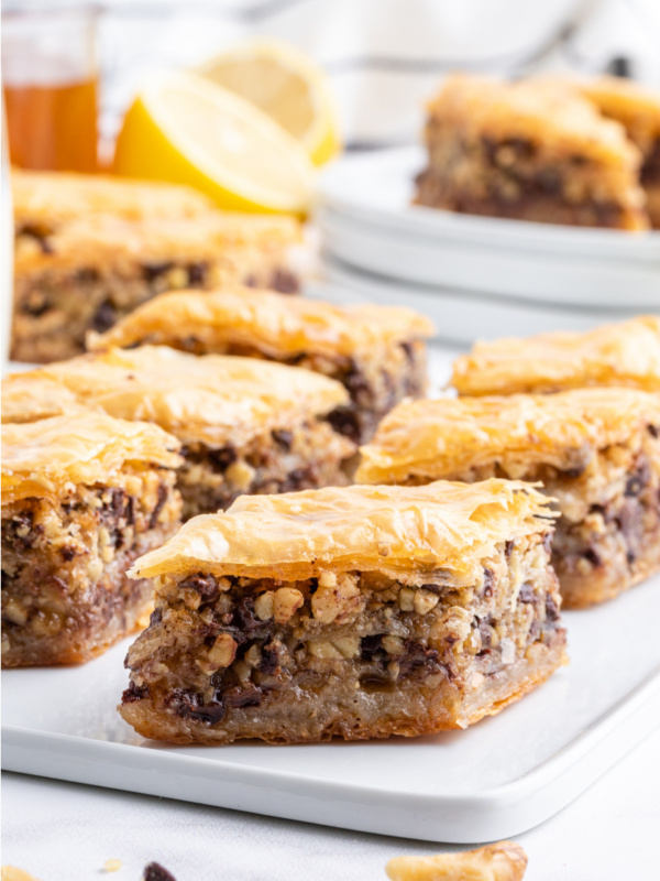 chocolate baklava on a white platter