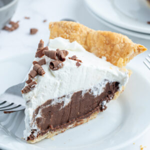 slice of chocolate cream pie on a plate