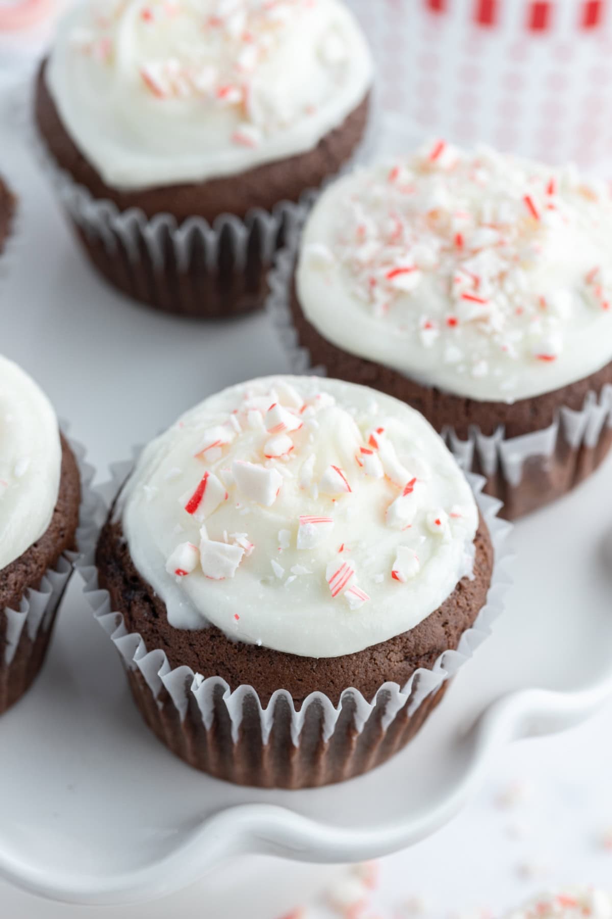 chocolate cupcakes with peppermint icing on display stand