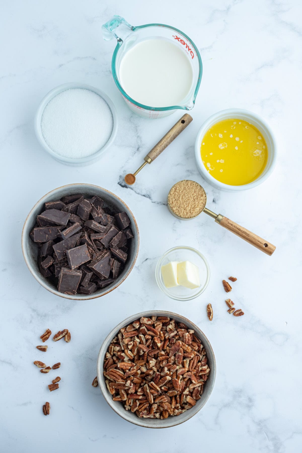 ingredients displayed for making chocolate pecan tart