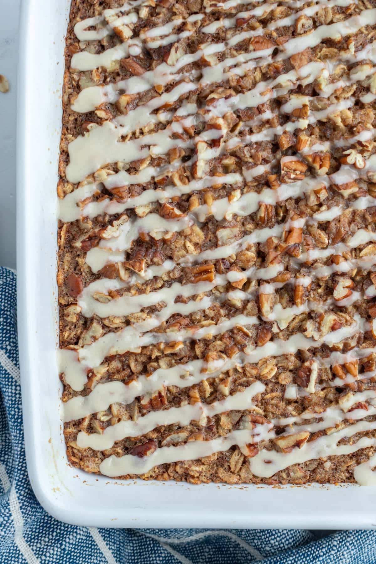 close up cinnamon roll baked oatmeal in baking dish