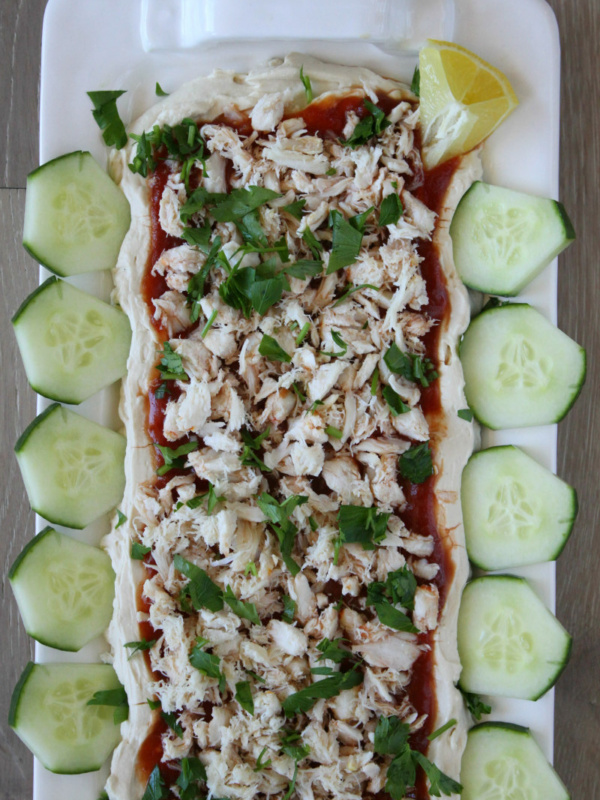 overhead shot of crab spread surrounded by sliced cucumber