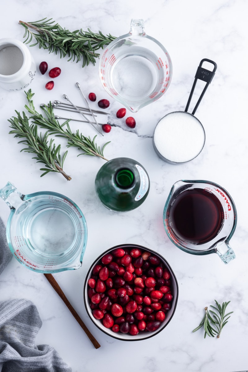 ingredients displayed for making cranberry gin spritzers