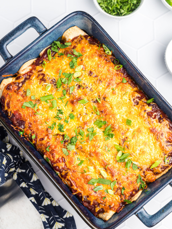 cranberry turkey enchiladas in a pan