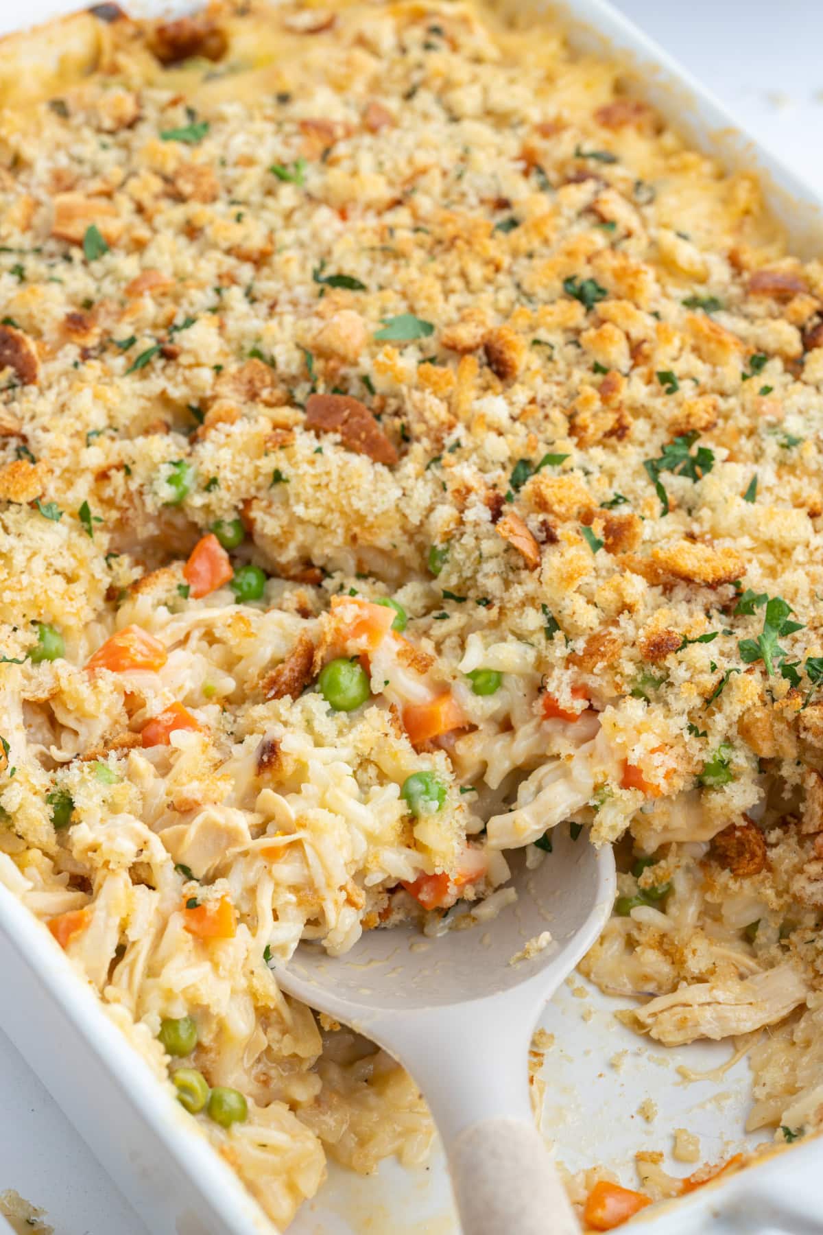 casserole dish full of creamy chicken and rice casserole