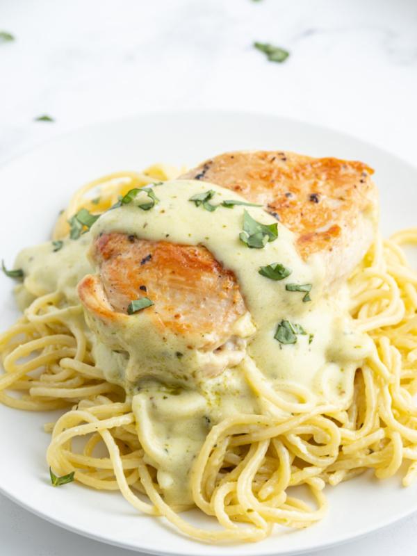 creamy pesto chicken over noodles