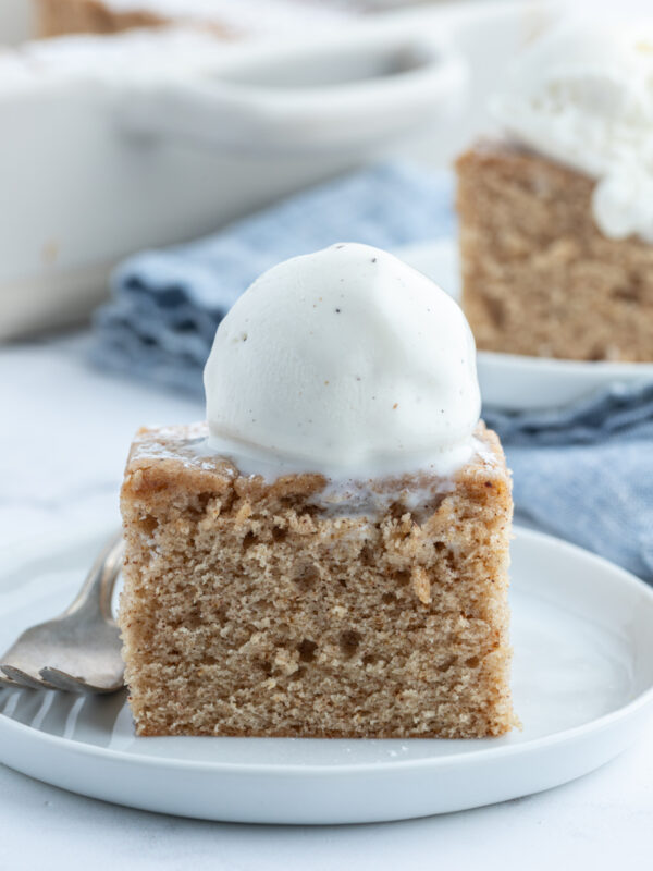 slice of ginger spice cake with ice cream on top