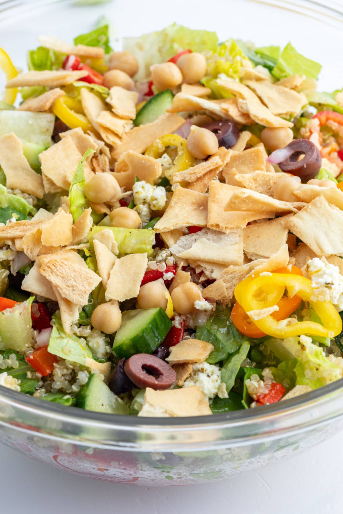 greek quinoa chopped salad in bowl