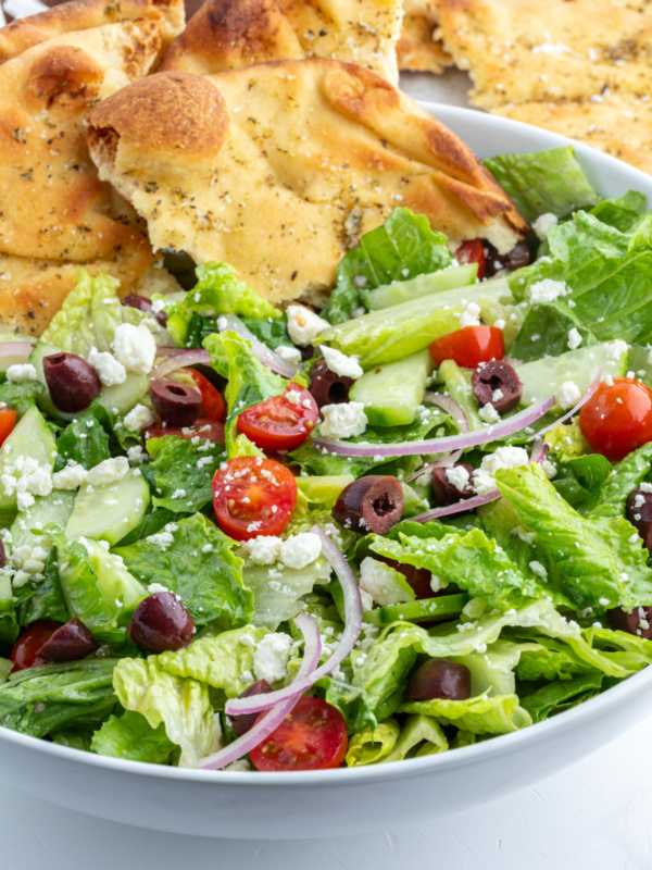 greek salad with seasoned flatbread