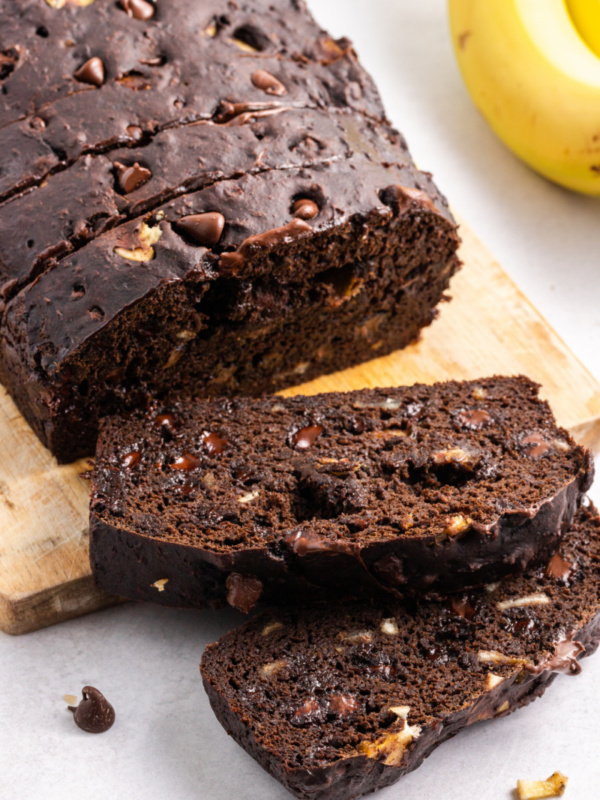 loaf of chocolate banana bread cut into slices