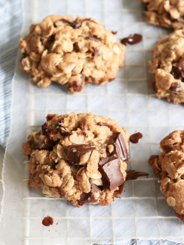 healthier chocolate chip oatmeal cookies on a cooling rack