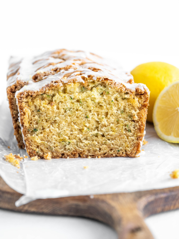 iced lemon zucchini bread cut open to see inside