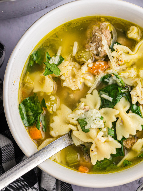 italian wedding soup in bowl with spoon