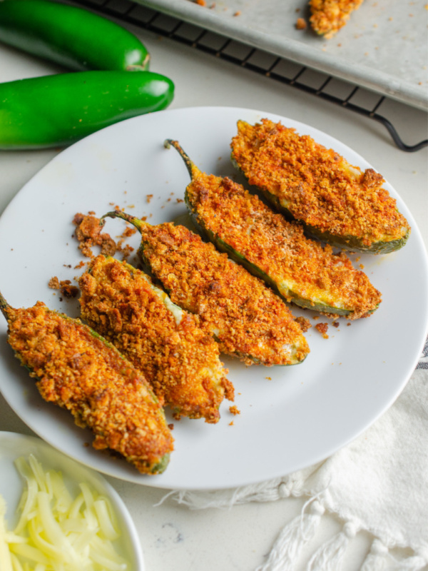 jalapeno poppers on a white plate