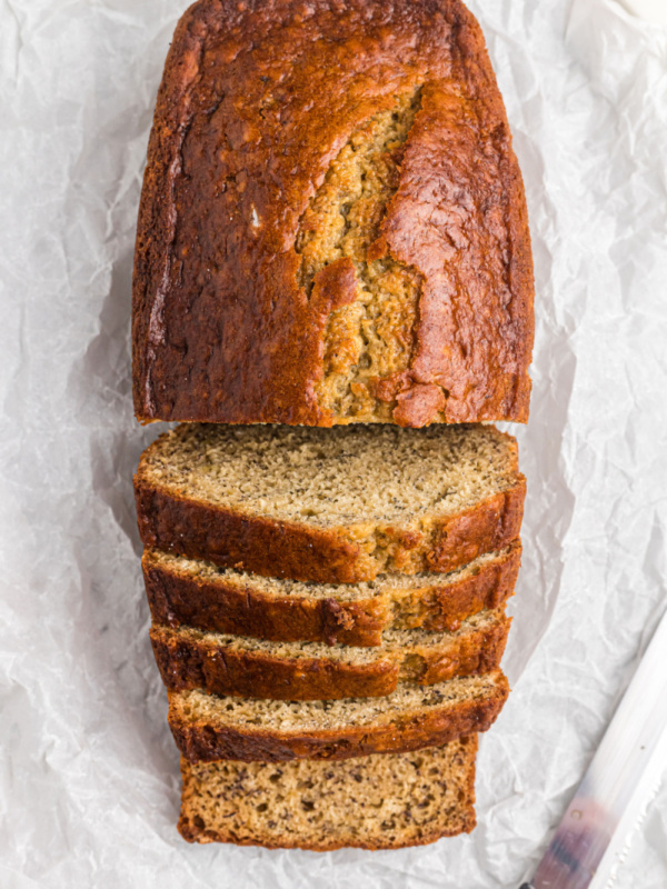 loaf of banana bread half sliced