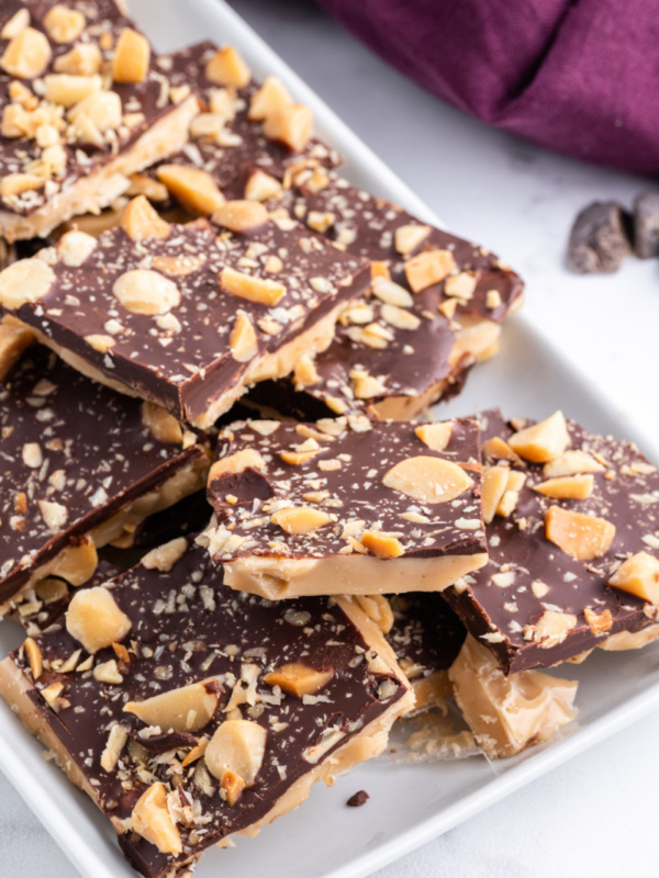 pieces of macadamia nut butter toffee on a platter