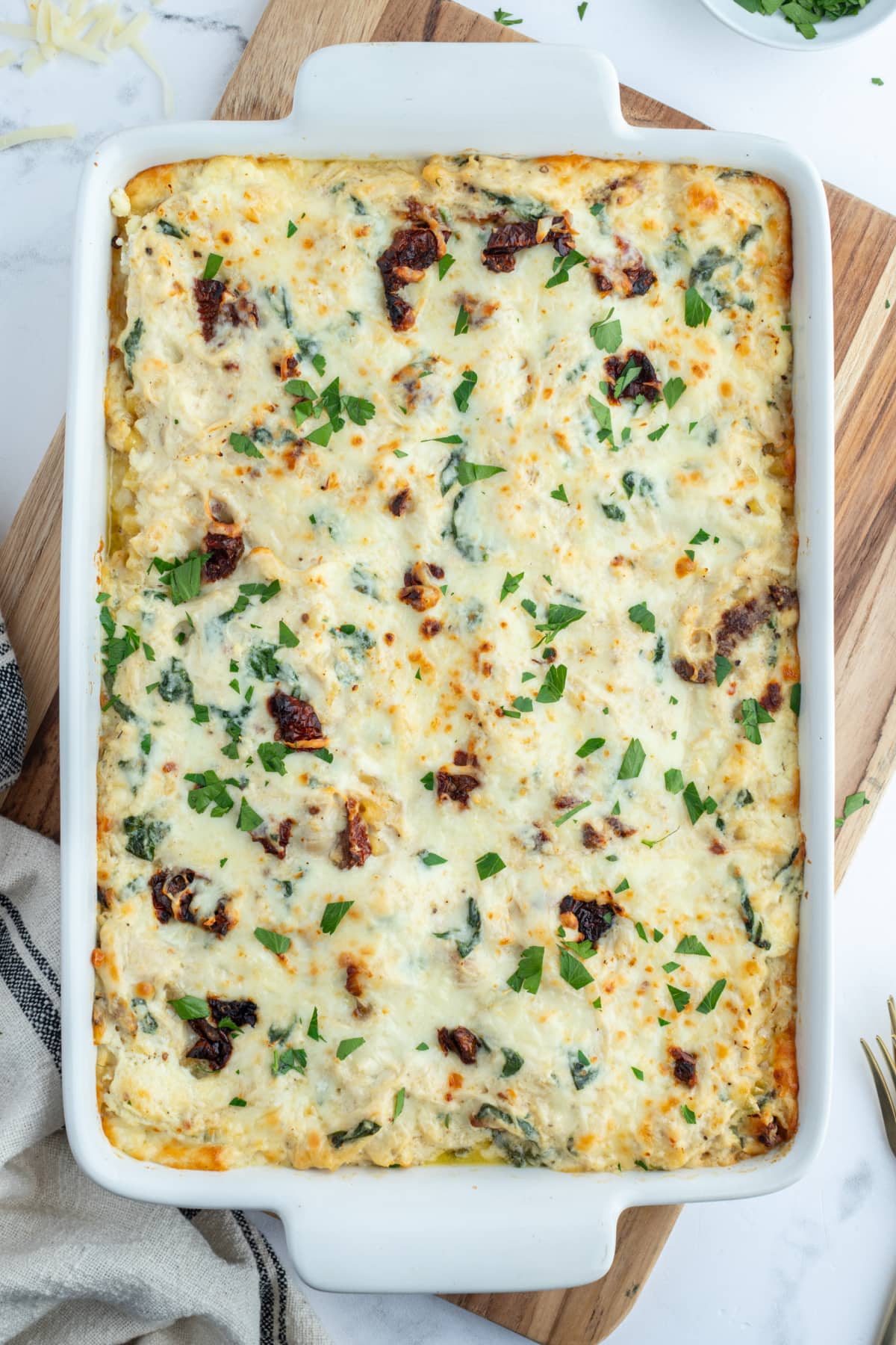 baking dish of marry me chicken lasagna