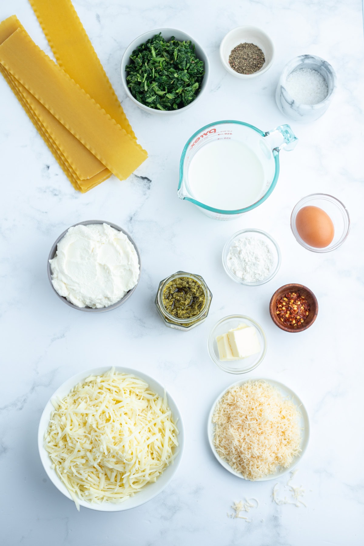 ingredients displayed for making pesto lasagna rolls