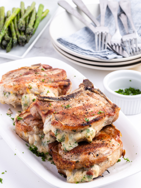 pork chops stuffed with smoked gouda on platter