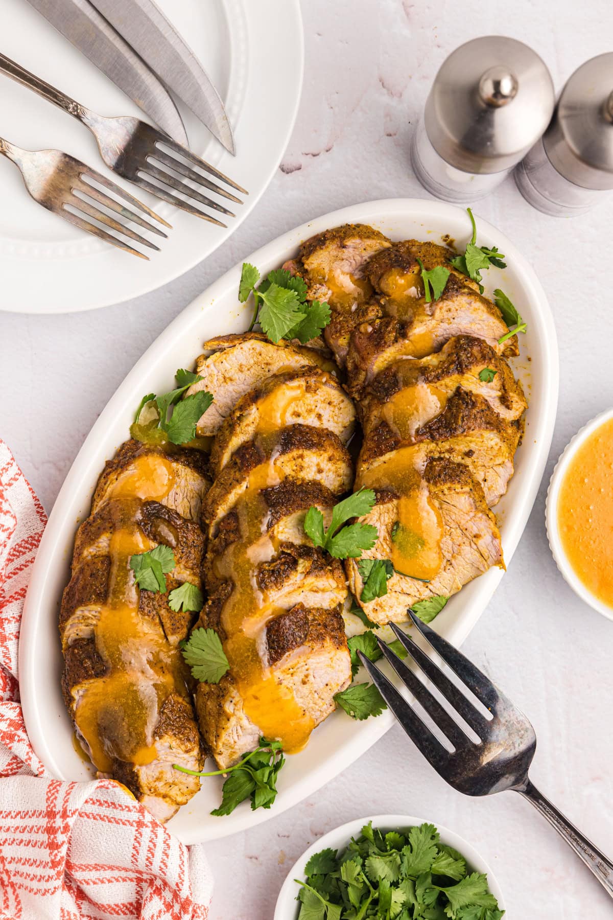 platter of pork tenderloin with apricot ginger sauce