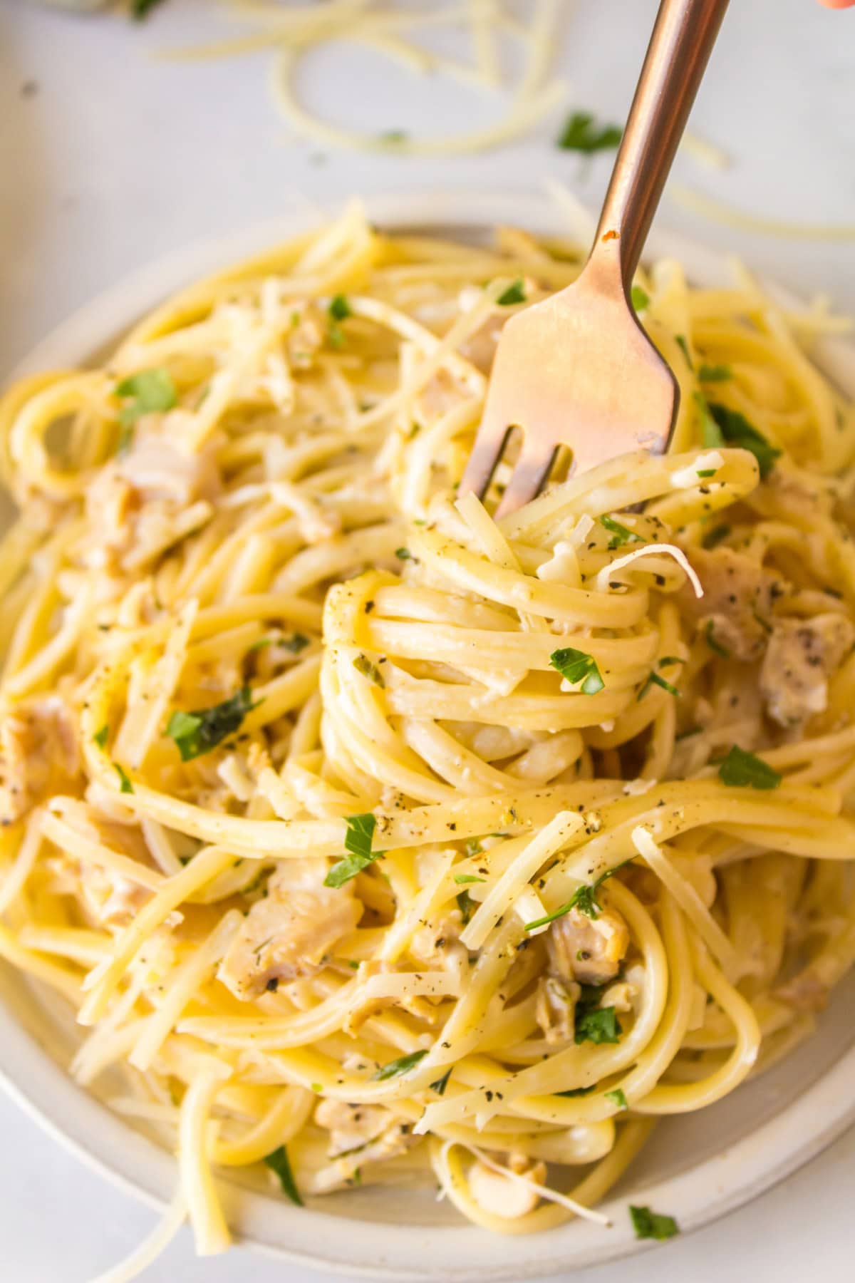 fork in a bowl of clam linguine