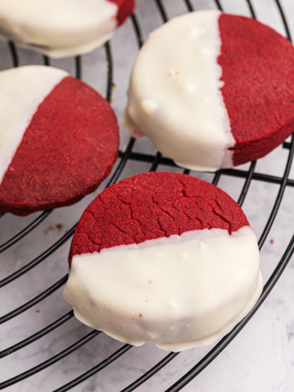 red velvet shortbread cookies dipped in white chocolate