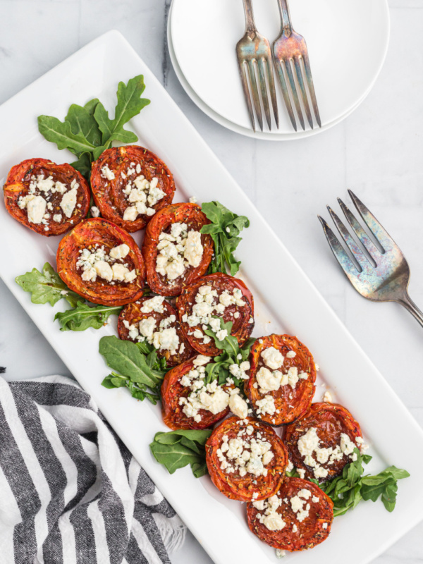 roasted tomatoes with stilton displayed on a platter