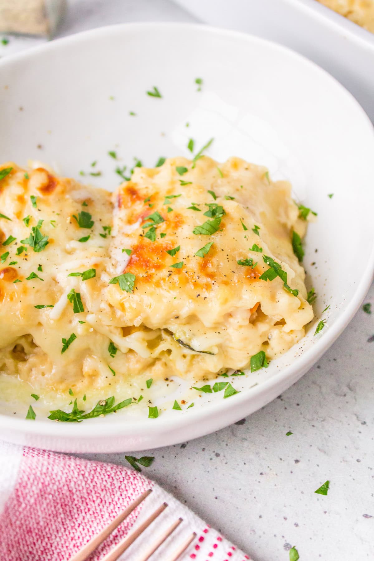 roasted vegetable lasagna roll ups in bowl