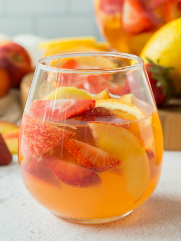 glass of strawberry peach sangria