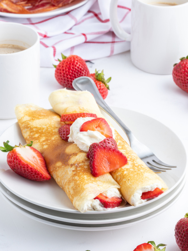 strawberry cream cheese crepes on plate