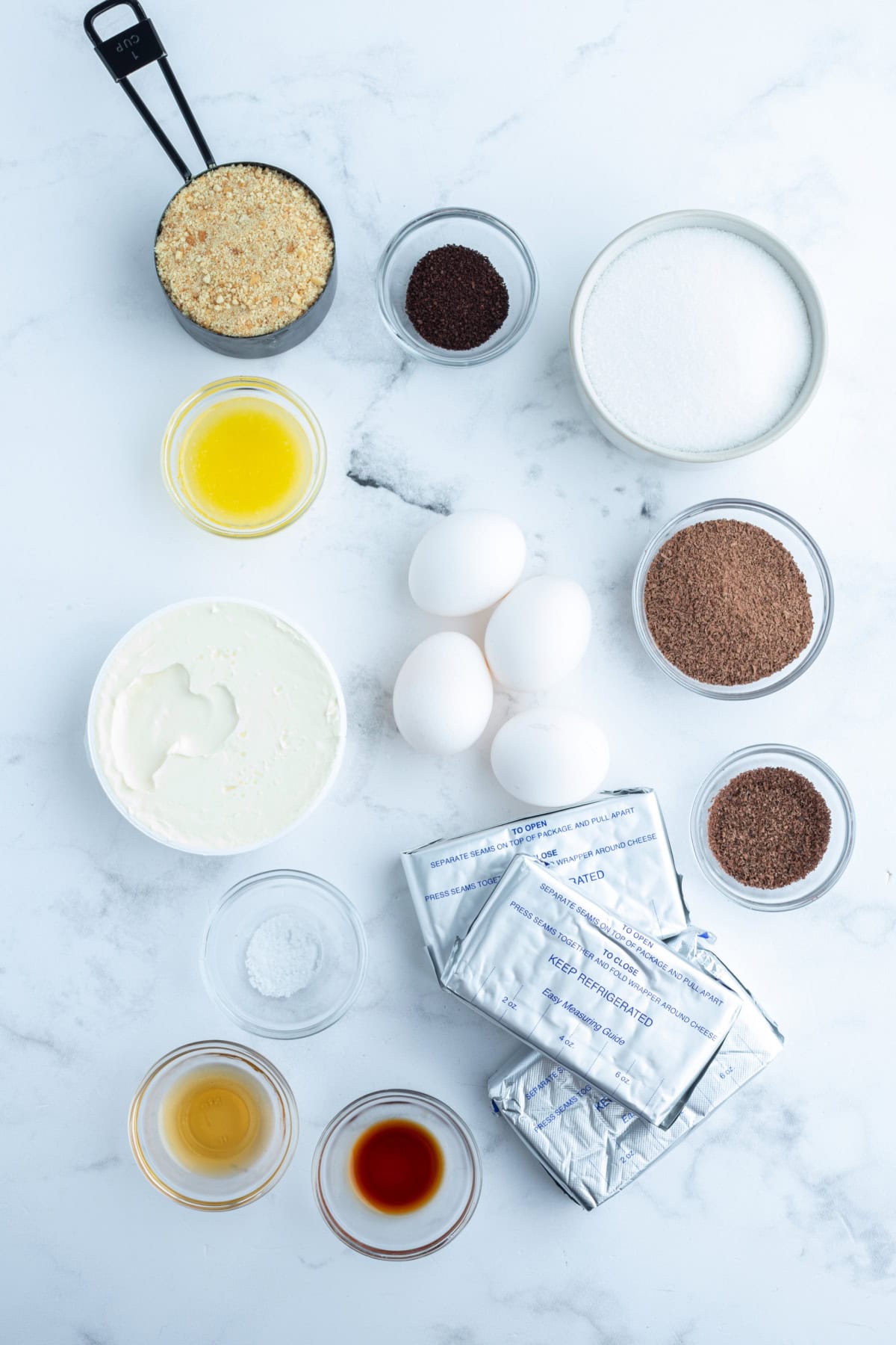 ingredients displayed for making tiramisu cheesecake