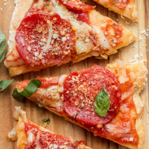 weight watchers pepperoni pizza slices on a cutting board