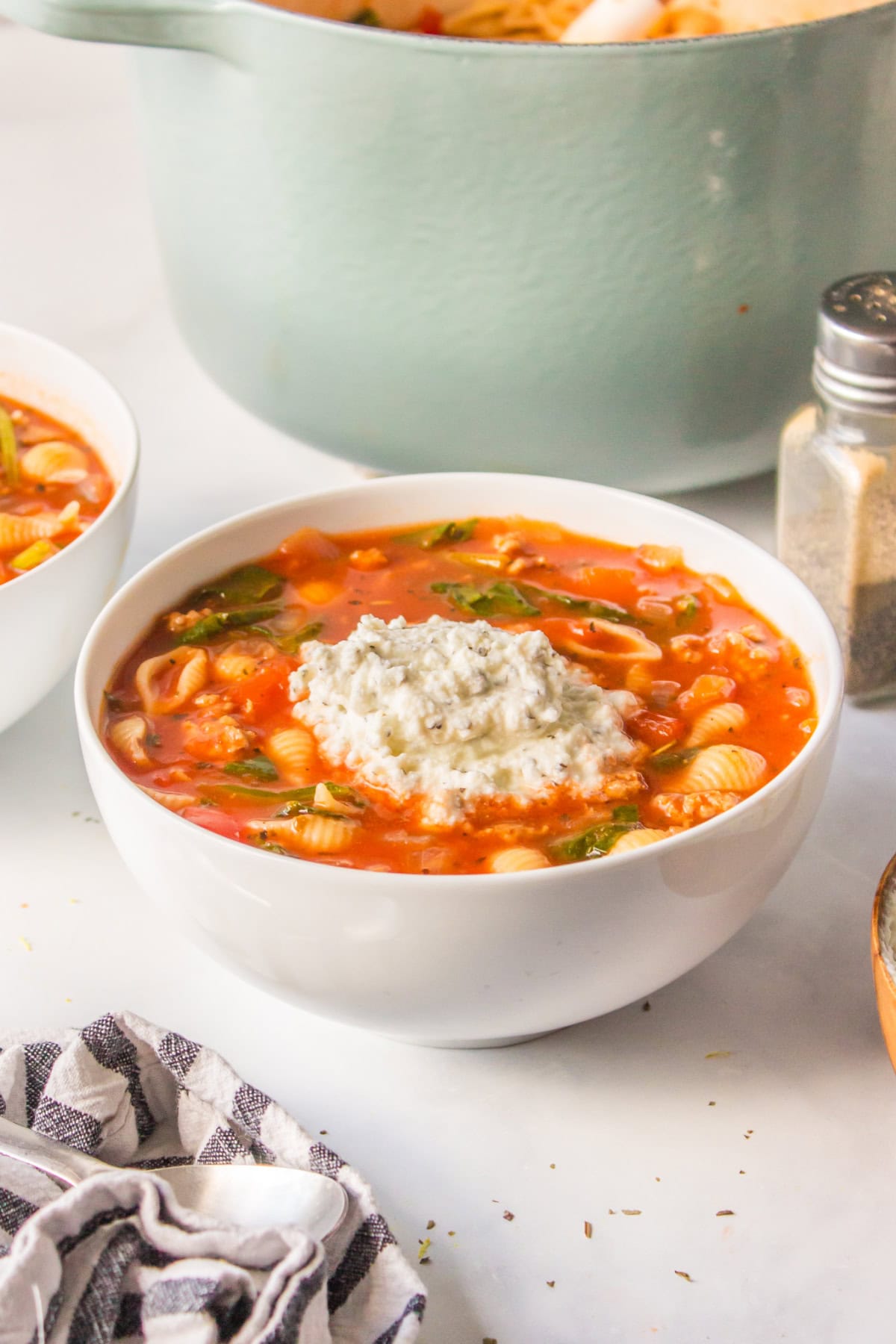 white bowl of unstuffed shells soup