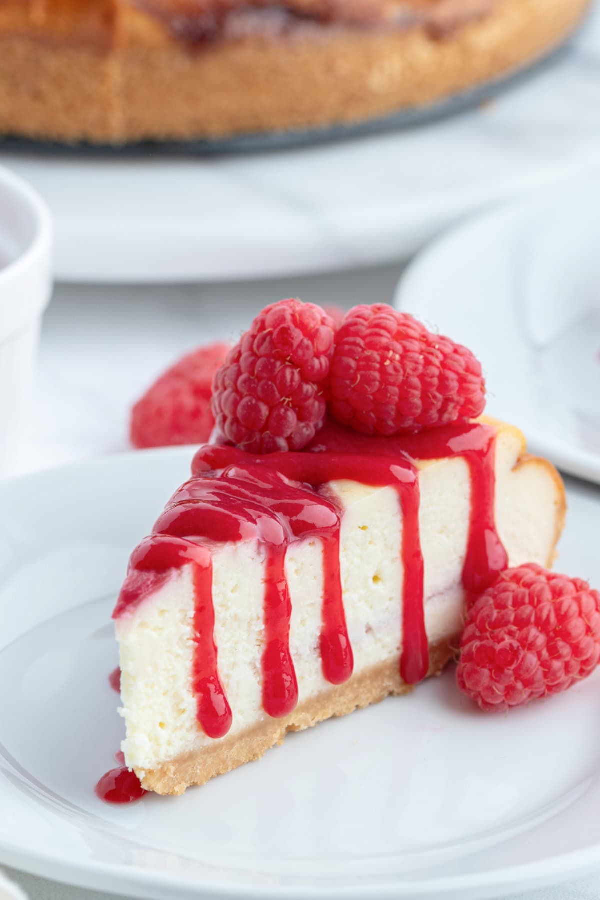 slice of white chocolate raspberry cheesecake